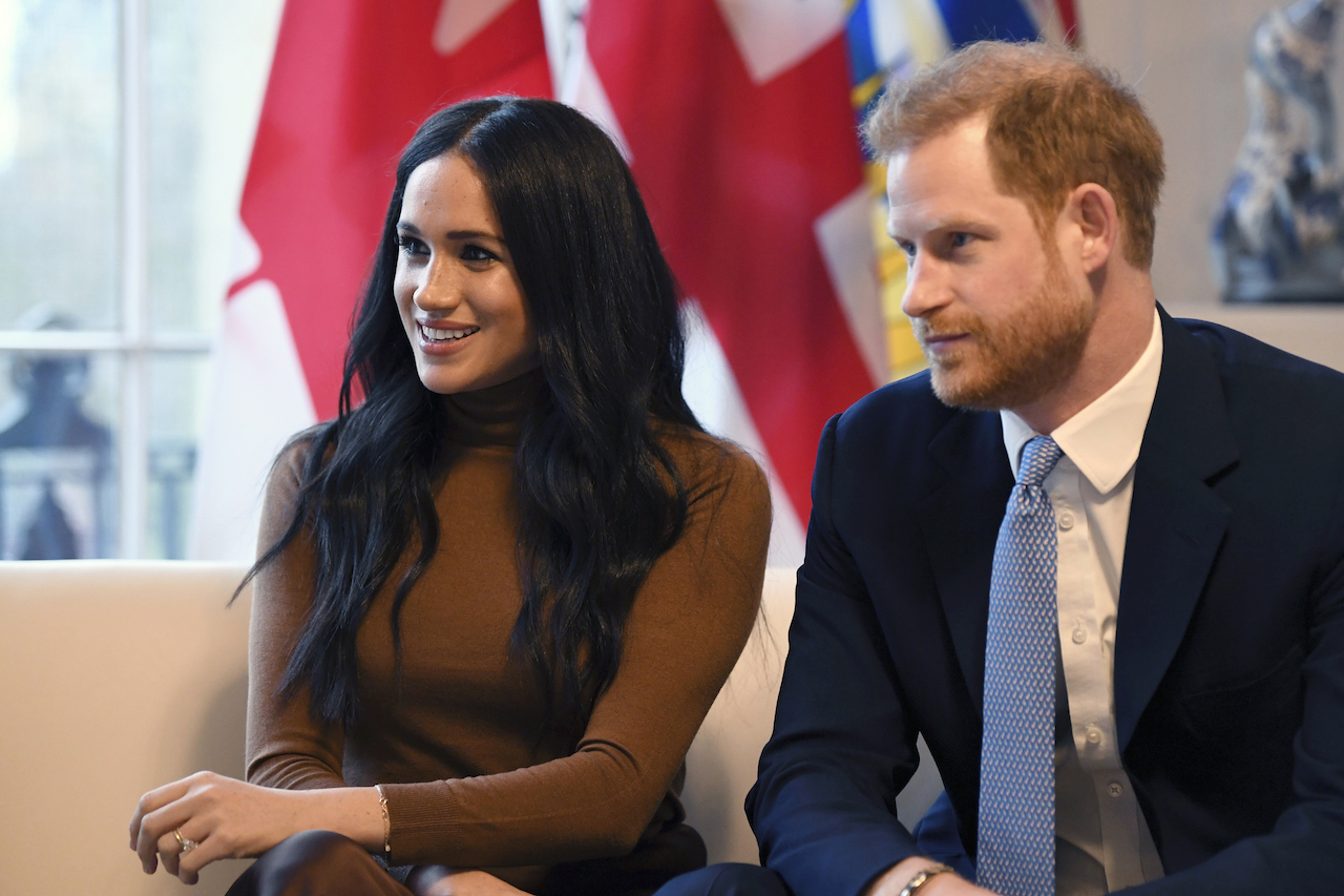 harry and meghan in LA delivering fodd for charity